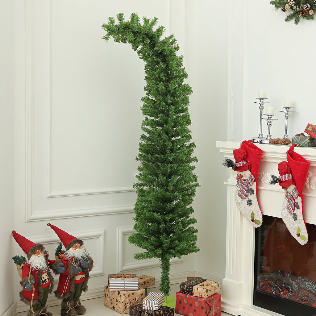 Whimsical pencil Christmas tree with curled top standing in living room