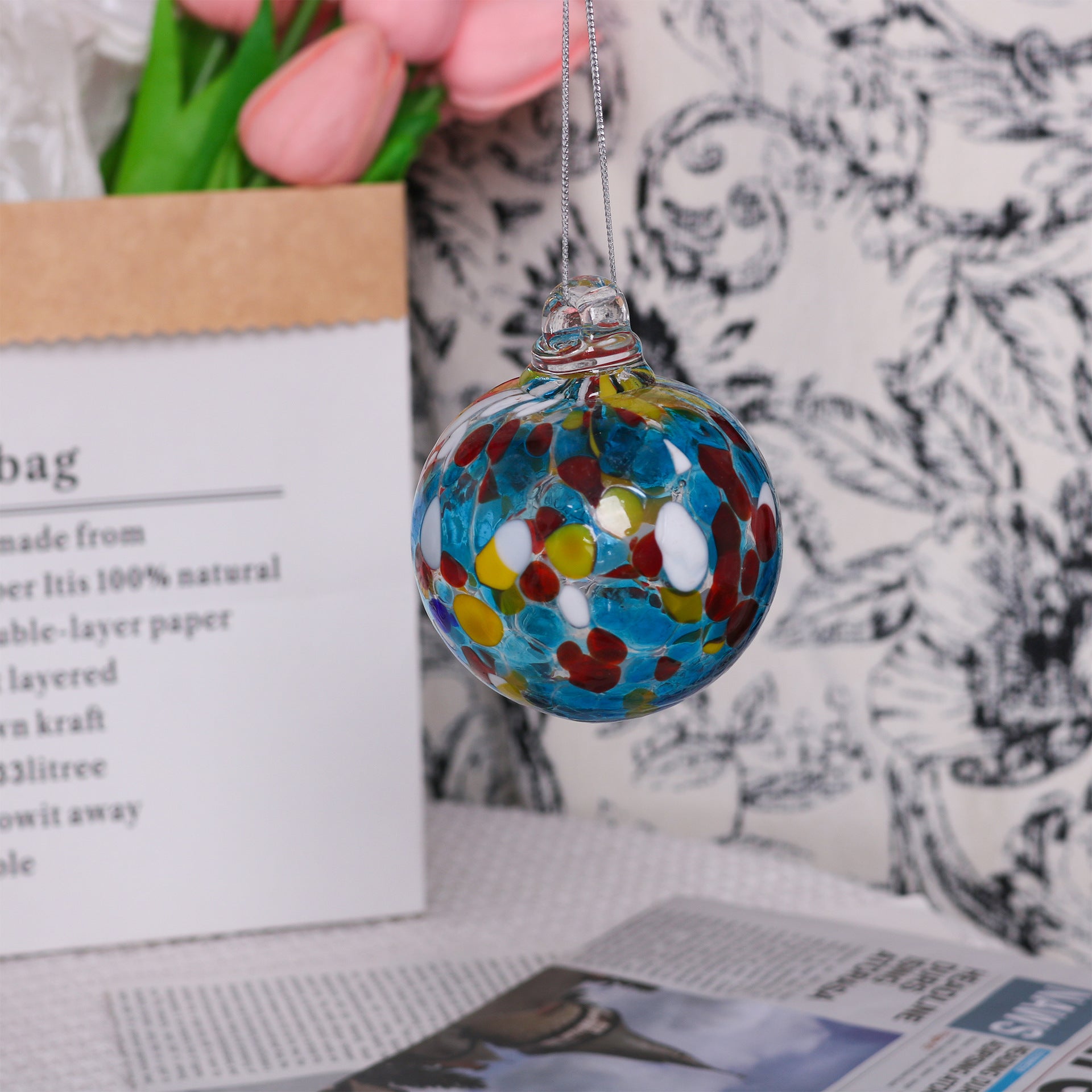 Close-up of hand-crafted transparent glass Christmas ornament surface detail