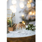Set of 12 glass Christmas ball ornaments with glitter and painted details on a festive background