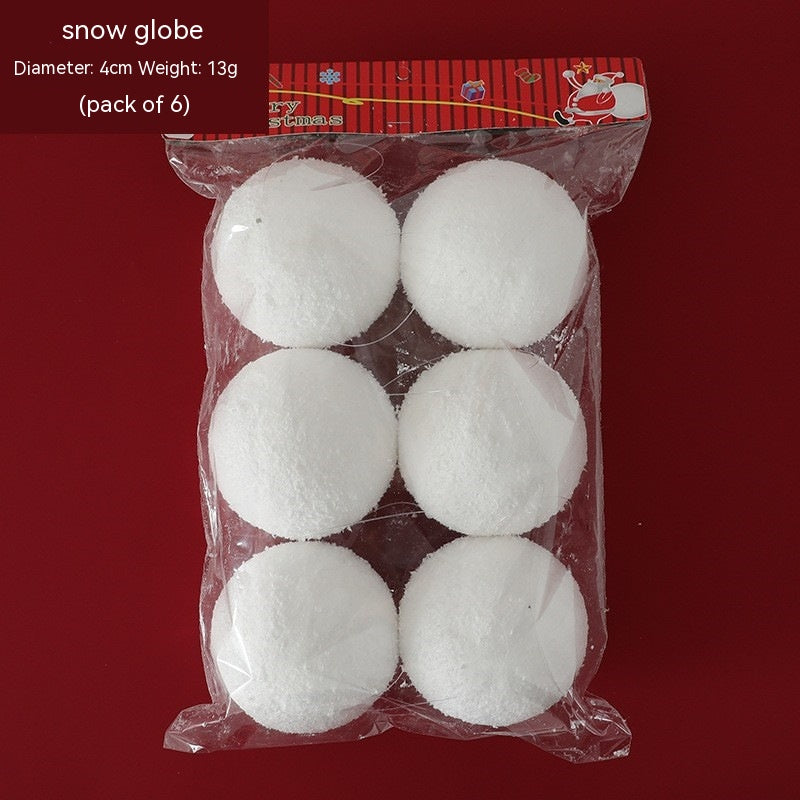 Pure white foam snowball ornaments displayed on a decorated Christmas tree