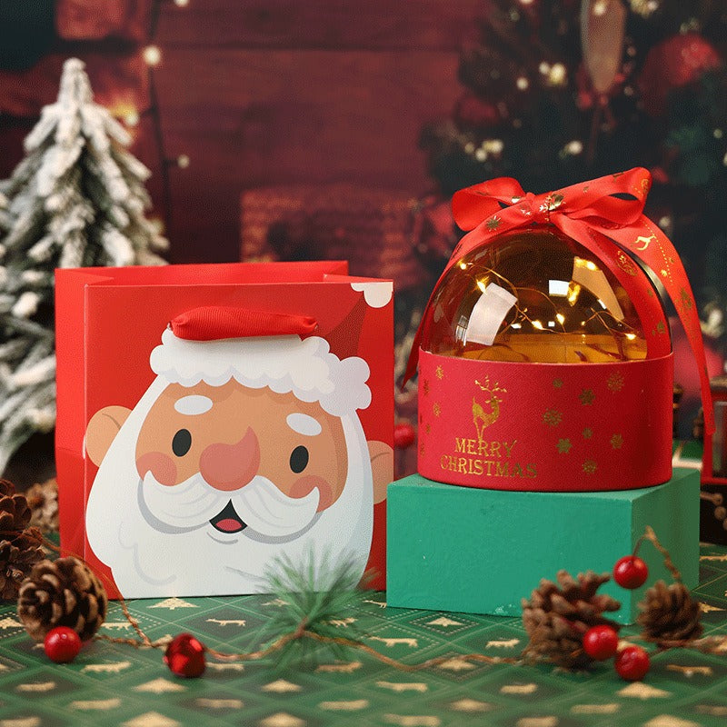 Clear acrylic Christmas gift box featuring red and green holiday theme