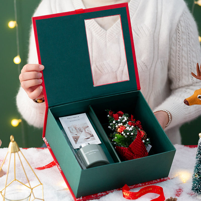 Red Christmas gift box with festive holiday styling for aromatherapy and gift-giving