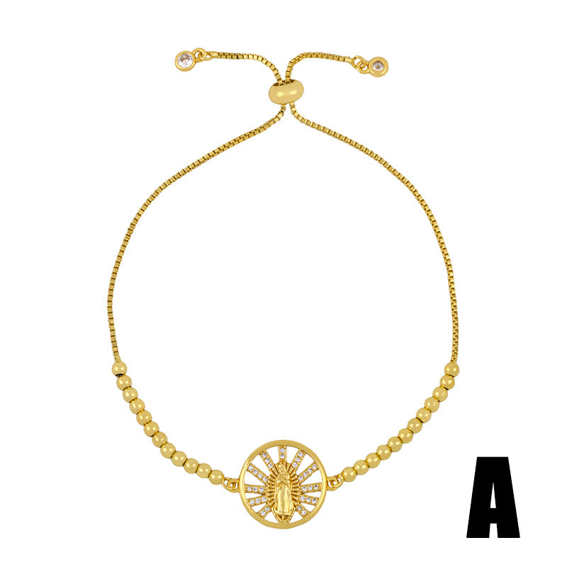 Religious Virgin Mary jewelry piece with gold plating and semi-precious stones