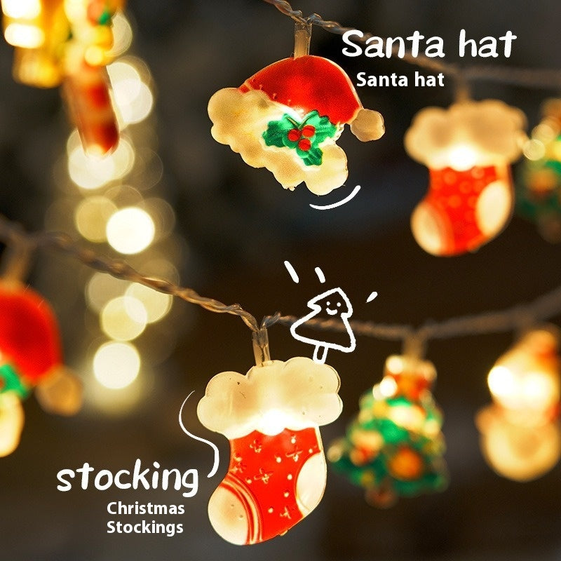 Battery-powered Christmas light chain arranged for holiday window decoration