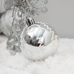 Christmas ball ornament displaying silver color and PVC material