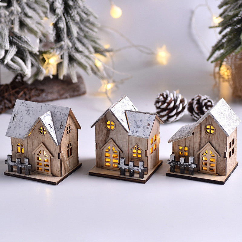 Cozy wooden Christmas house with soft LED glow for holiday display