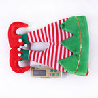 Stack of red and green Christmas hats for holiday gifting