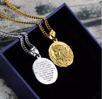 Jesus pendant necklace displayed on white surface with chain detail visible