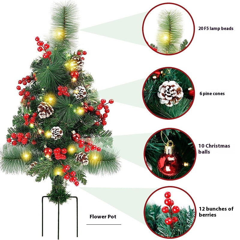 Solar Christmas tree lawn lamp glowing outdoors