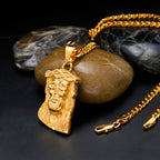 Jesus pendant displayed against neutral background