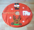 Red Christmas Tree Skirt in festive holiday setting with presents beneath tree