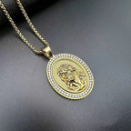 Polished geometric Jesus pendant detail on gold-plated chain