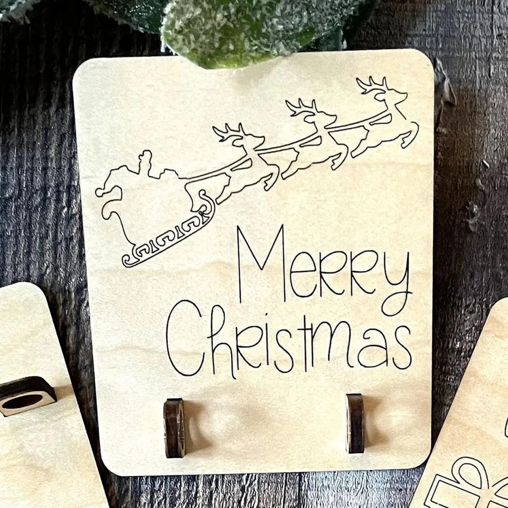 Wooden Christmas tree money clip rack for holding bills on a festive table Main image