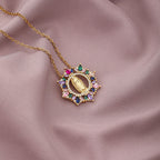 Five Virgin Mary necklace design variants displayed together on display stand