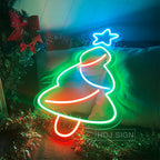 Christmas tree neon sign against dark background showing luminous glow effect