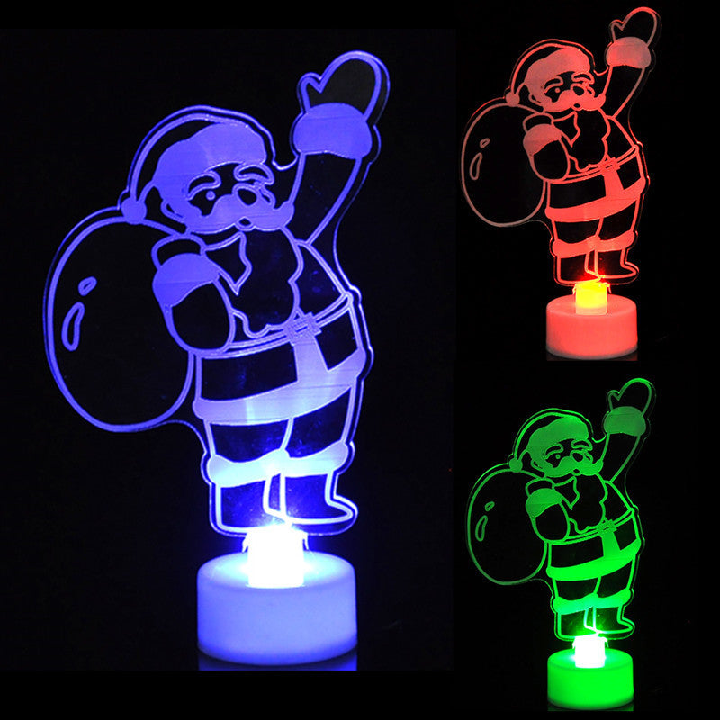 Christmas tree ornament with soft colorful glow illuminating its acrylic surface