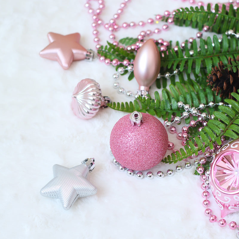 Festive Christmas ornaments arranged in gift box packaging