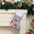 Gray embroidered Christmas stocking with bear design for holiday decor