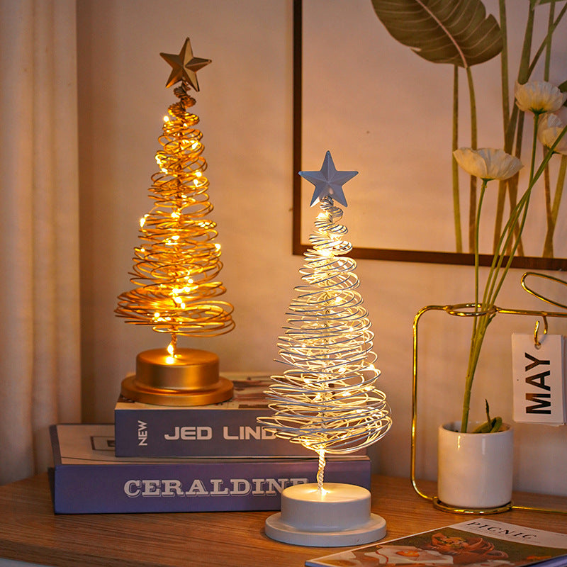 Compact iron Christmas tree light with warm LED glow for desk or mantel