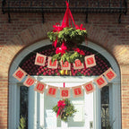 Red and brown burlap Christmas banner flags strung together for festive party decoration