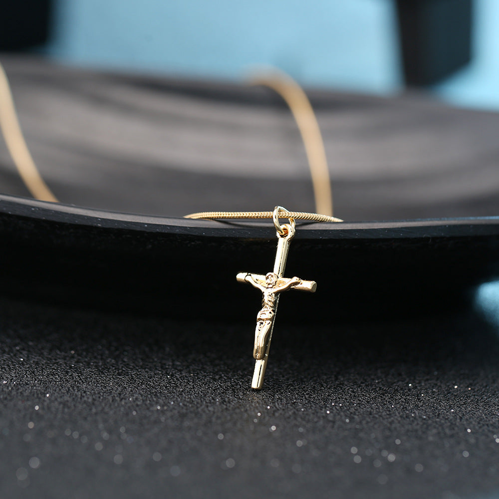 Faith-inspired gold cross necklace display