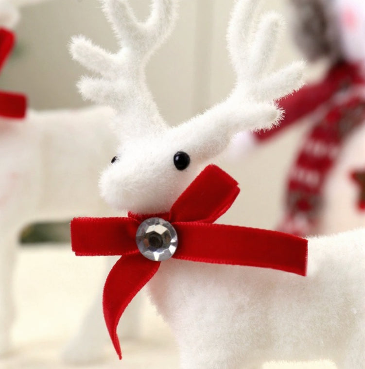 Festive plush moose toy representing woodland Christmas decorations