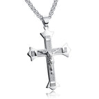 Close-up view of stainless steel cross pendant detailing