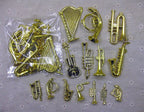 Miniature musical instrument ornaments with electroplated finish on a decorated Christmas tree