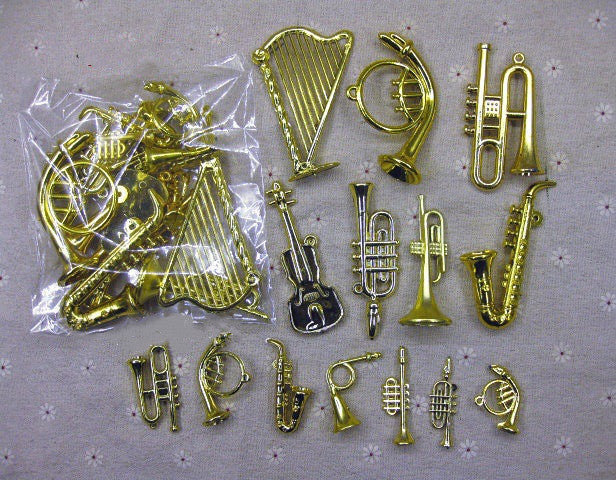 Miniature musical instrument ornaments with electroplated finish on a decorated Christmas tree