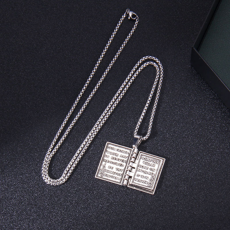 Unisex Christian pendant with turnable book design