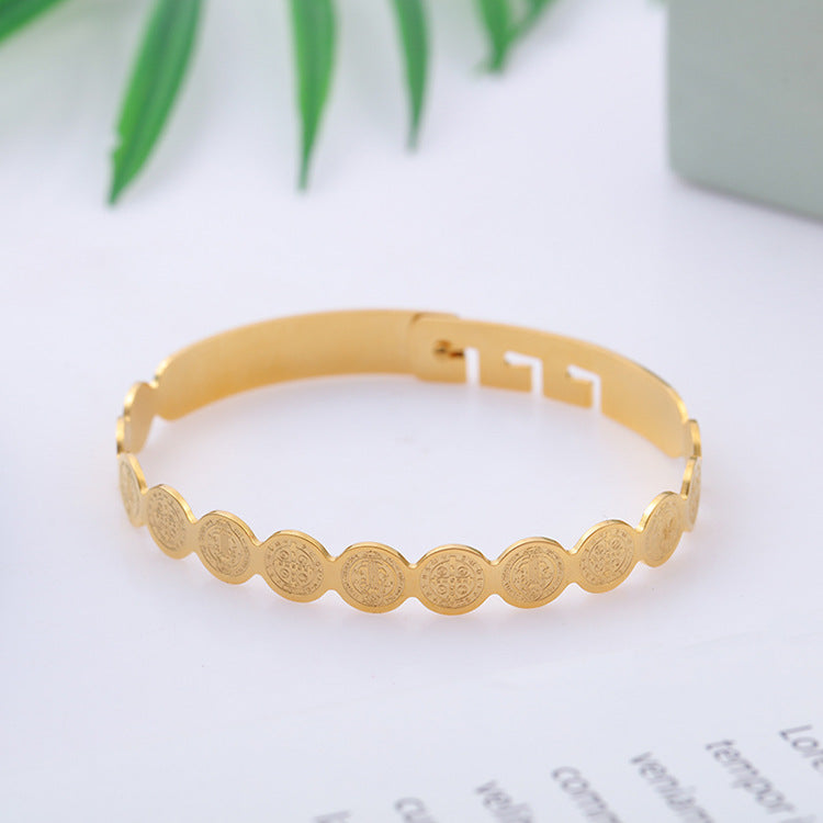 Creative religious bracelet featuring scripture inspiration in warm gold plating