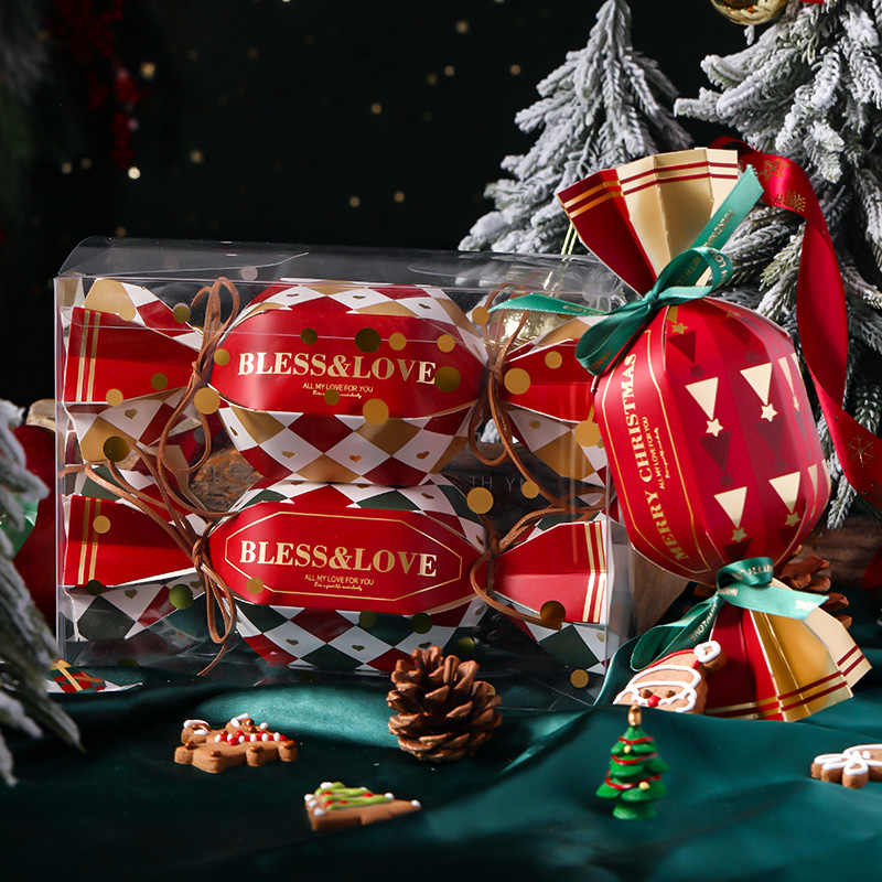 Christmas gift boxes with assorted stickers and ribbon accessories