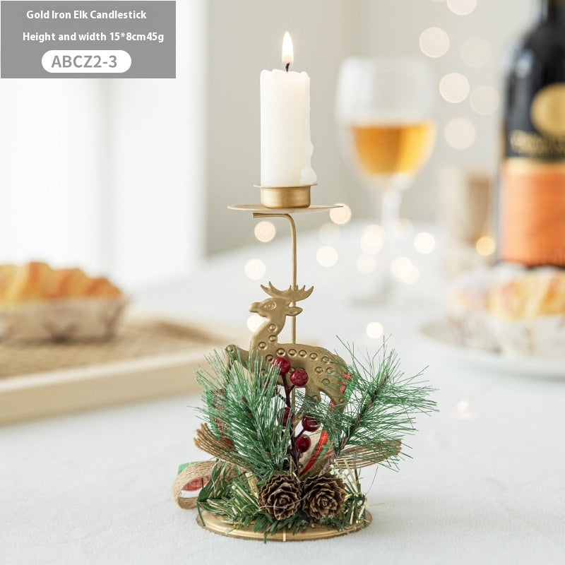 Star topped golden wrought iron candlestick for Christmas
