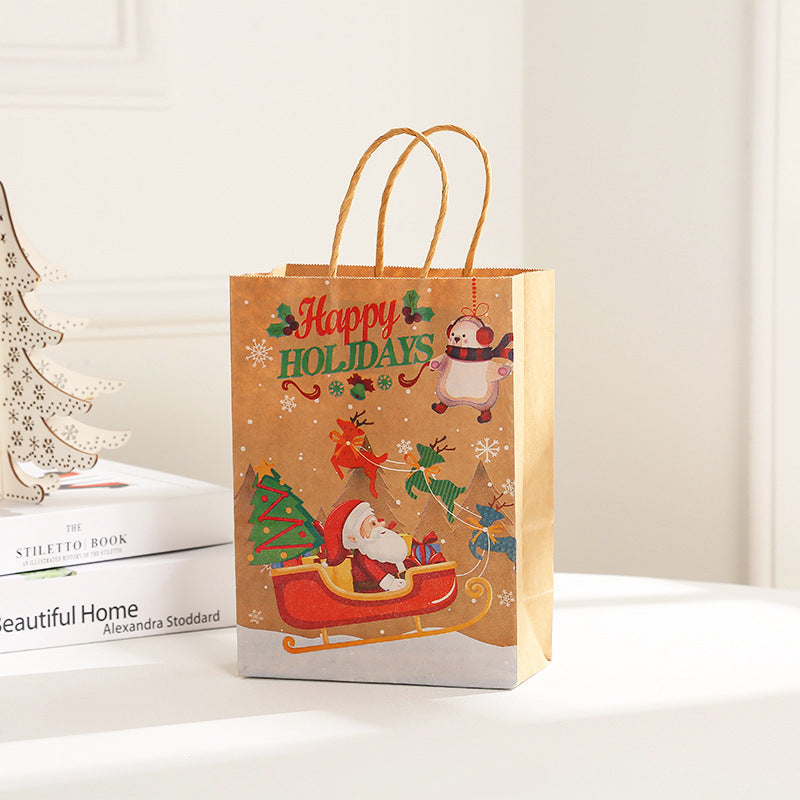 Holiday gift bag with reinforced paper rope handles and Christmas theme