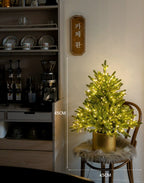 Holiday Christmas tree decoration featuring 100 lights for tabletop display