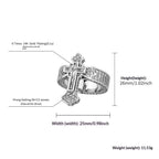 Close-up detail of the cross motif on a polished gold ring