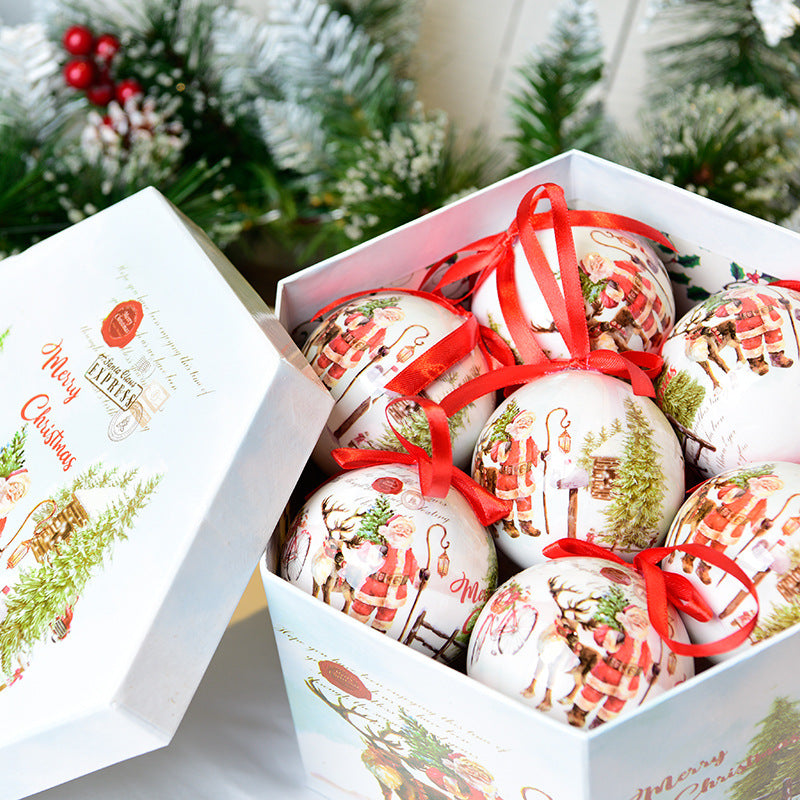 Christmas gift box with tree pendant decoration displayed Main image