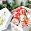 Christmas gift box with tree pendant decoration displayed