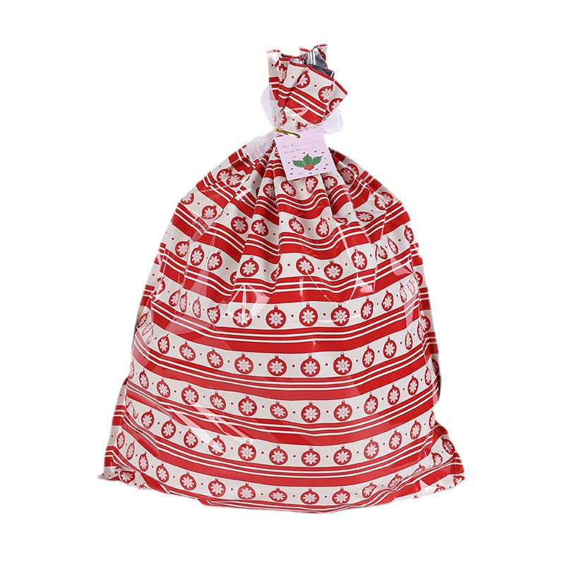 Festive red and gold Christmas gift bags with drawstring closure for celebrations
