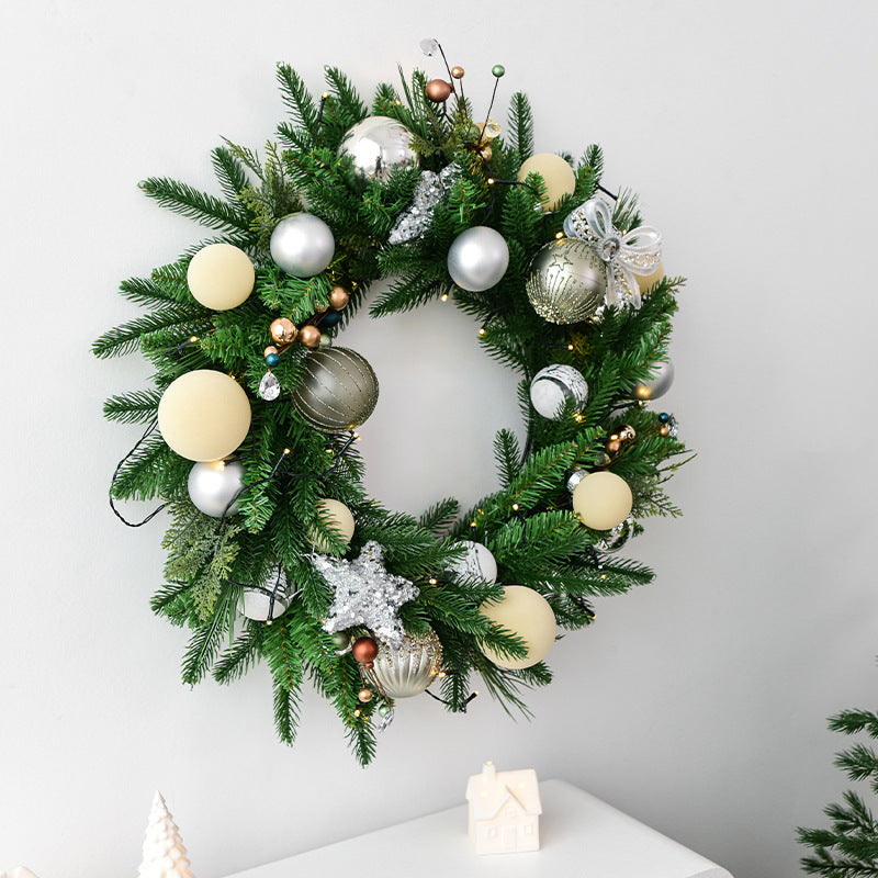 Green pine leaf Christmas garland with lamp lights arranged for display