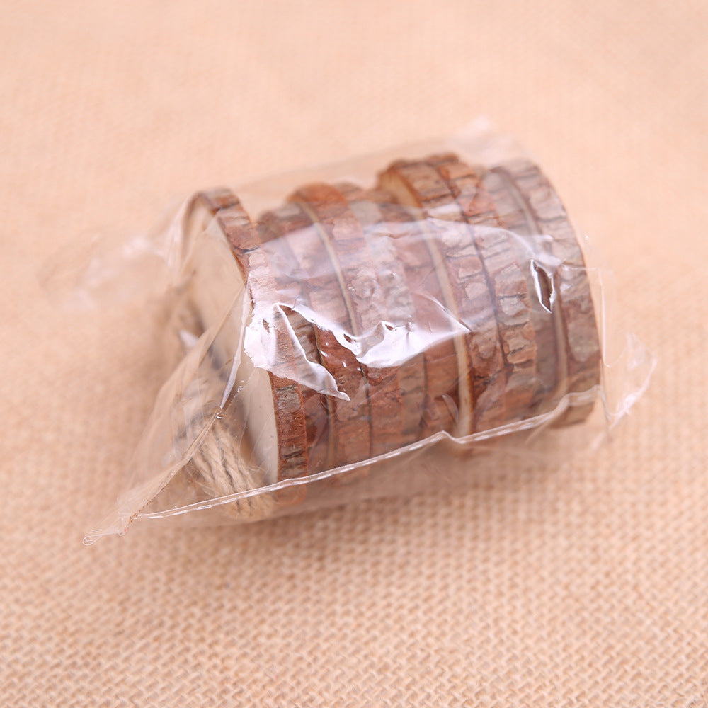 Natural solid wood pendant blanks arranged for DIY Christmas crafting projects