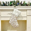 Gilded plush Christmas stocking gift bag with rich golden accents for holiday home decor