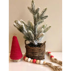 Mini Christmas tree decorations set in traditional holiday colors for gifting