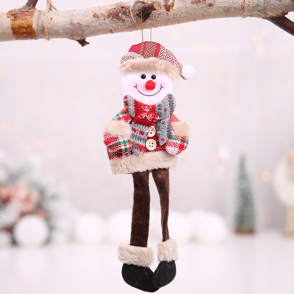 Close-up of button-decorated plaid cloth Christmas pendant