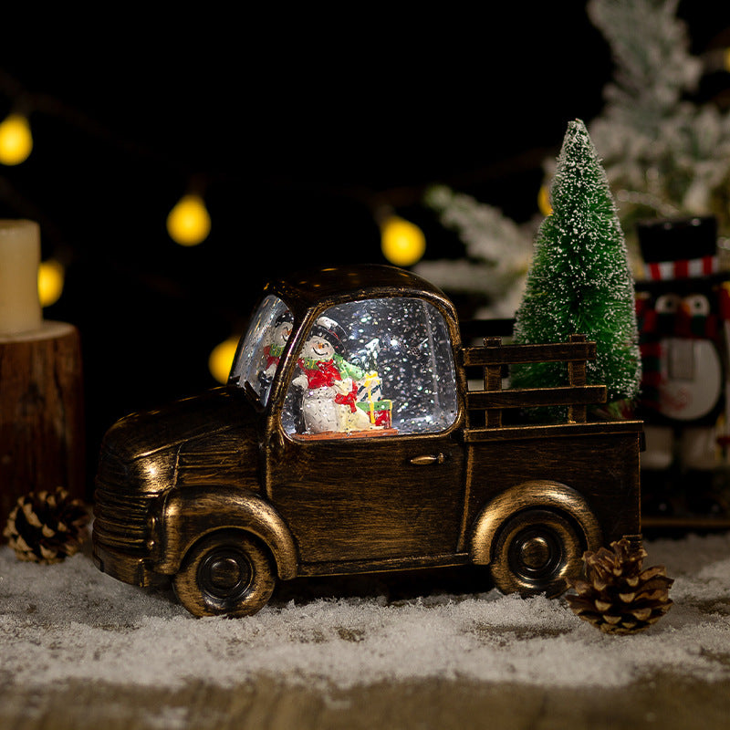Christmas crystal ball ornament with music on festive display Main image