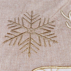 Flat lay view of 48-inch linen Christmas tree skirt in gold and white colors