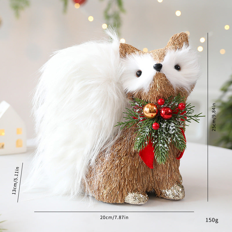 Set of three straw woodland animal Christmas ornaments displayed