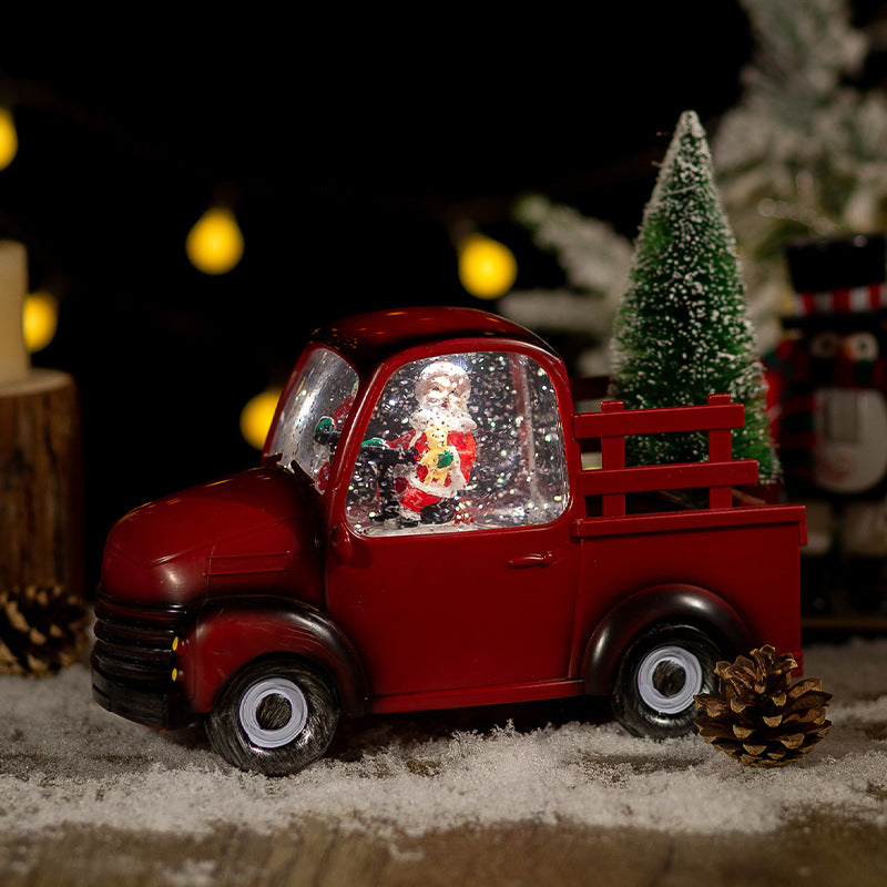 Festive snow globe ornament with warm holiday tones