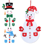 Felt snowman craft displayed on nursery wall beside Christmas ornaments