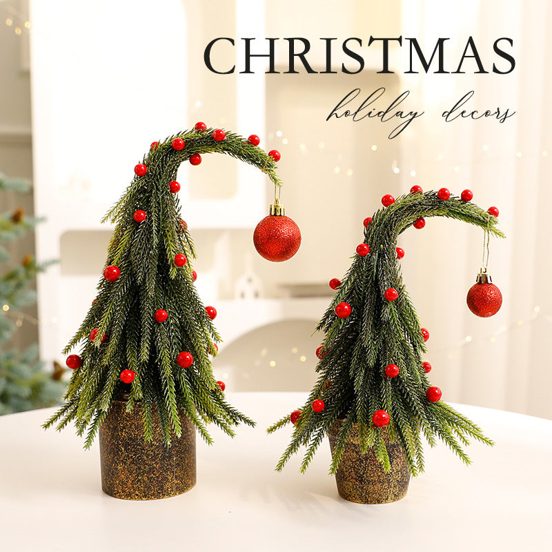 Red wry neck Christmas tree ornament displayed on desktop